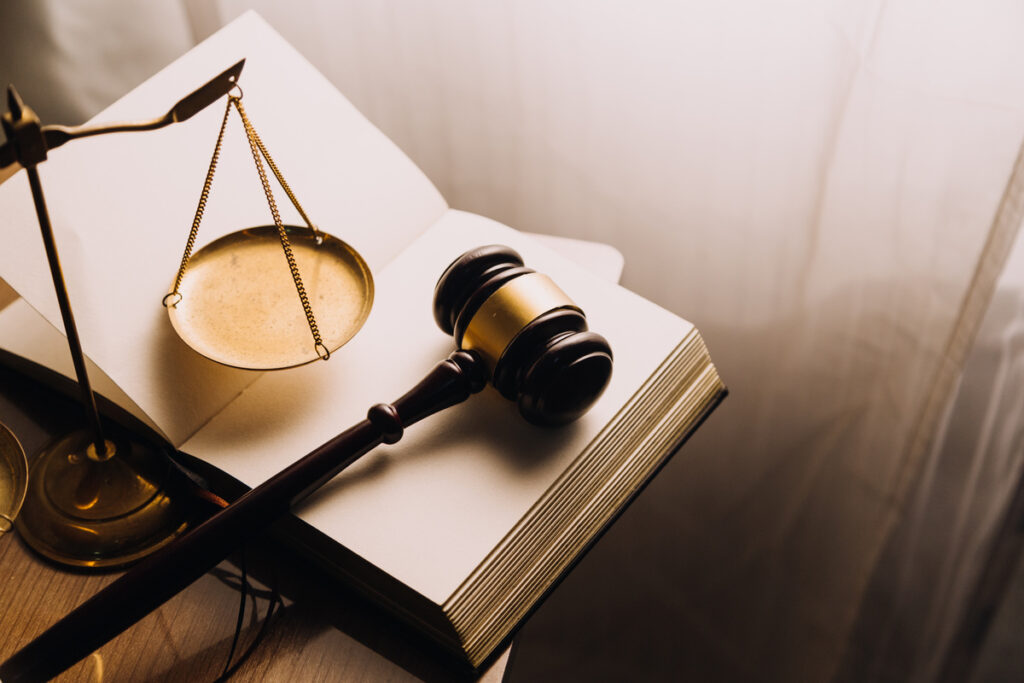 Justice and law concept.Male judge in a courtroom with the gavel